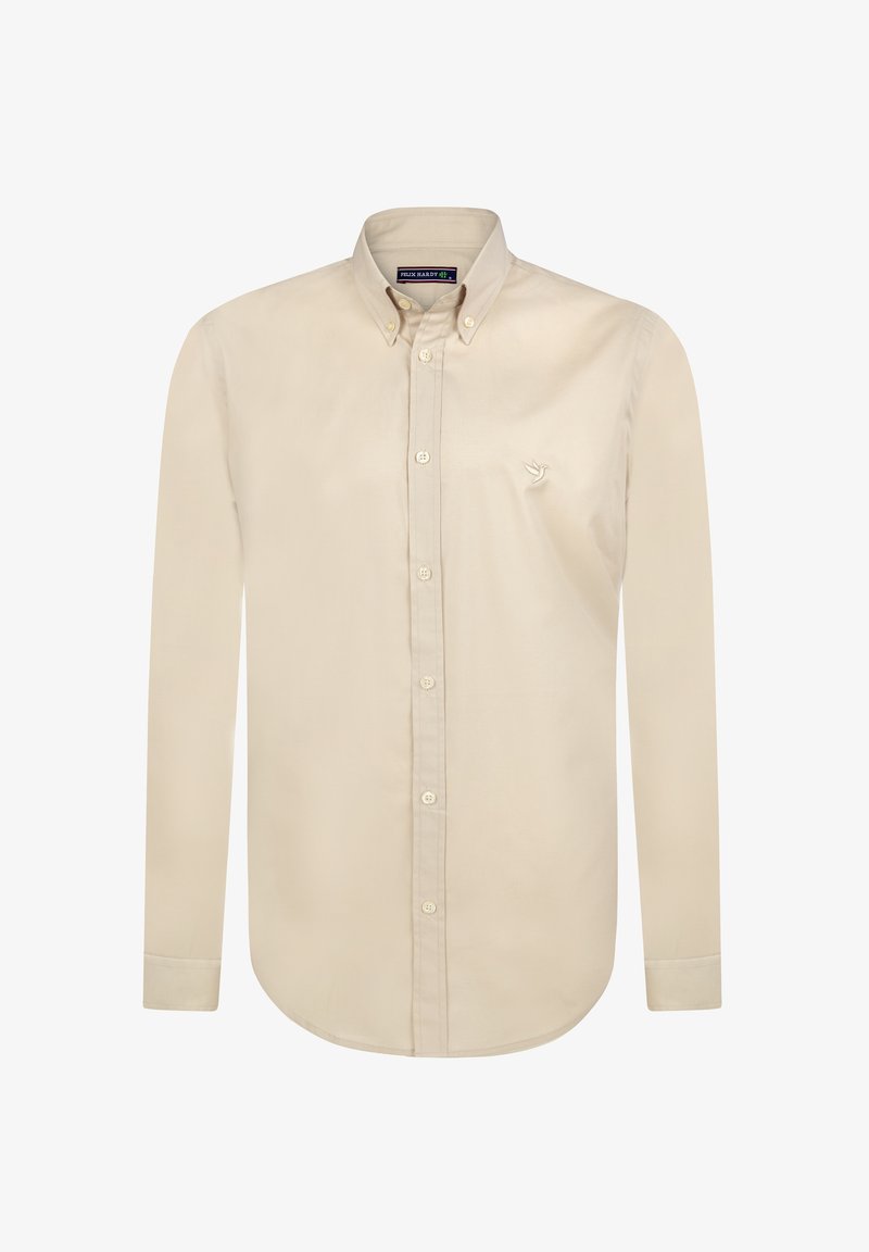Camisa de manga larga color beige claro con cuello abotonado, que presenta un sutil logo bordado en el pecho y un clásico cierre de botones en la parte delantera.