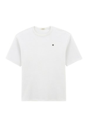 T-shirt en coton blanc à manches courtes, col rond, avec un petit logo noir sur la poitrine gauche. Texture douce et coupe régulière.