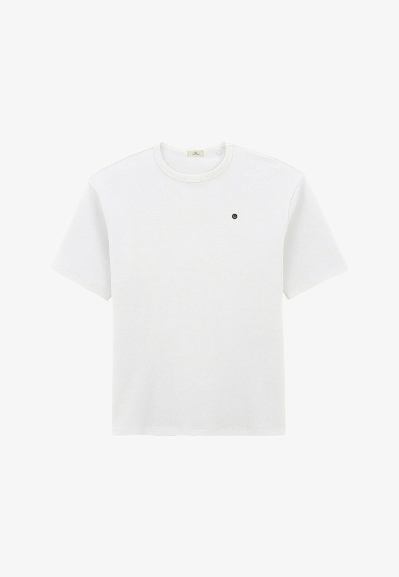 T-shirt en coton blanc à manches courtes, col rond, avec un petit logo noir sur la poitrine gauche. Texture douce et coupe régulière.