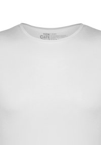 T-shirt blanc à manches courtes avec un col rond et une texture lisse. Présente "TEN CATE" imprimé à l'intérieur de la zone du cou. Design épuré.