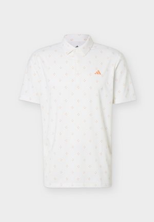 Fehér rövid ujjú galléros póló apró narancssárga rombuszmintával és narancssárga Adidas logóval a bal mellrészen.