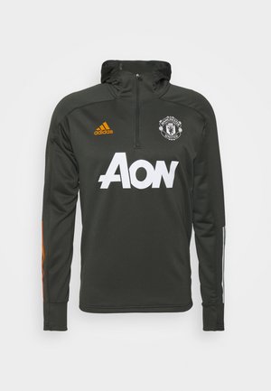 Haut d'entraînement Manchester United gris foncé avec demi-fermeture éclair, logo Adidas orange, logo sponsor Aon blanc, et poignets avec ouverture pour le pouce sur les manches longues.