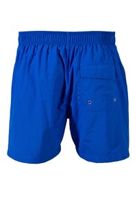 Shorts de sport bleus fabriqués en tissu léger. Dotés d'une taille élastique, d'une poche latérale et d'une texture lisse.