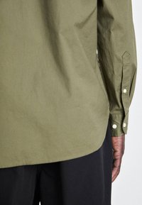 Tommy Hilfiger SHIRT - Camicia - utility olive