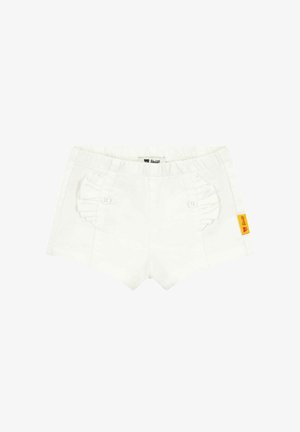 Bílé kraťasy s volánkovým detailem kapsy a dvěma knoflíky na každé straně. Elastický pas a malá žlutá nášivka na boku.