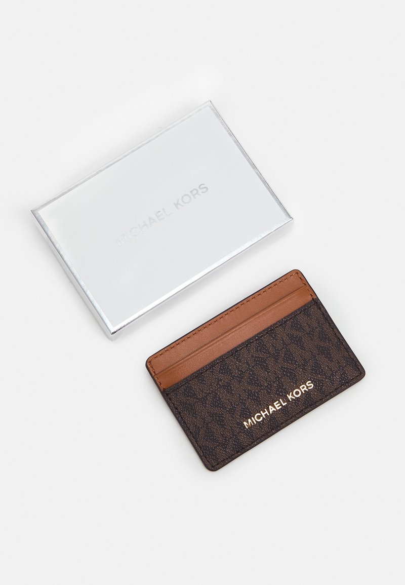 Total 39+ imagen michael kors card holder jet set - Abzlocal.mx