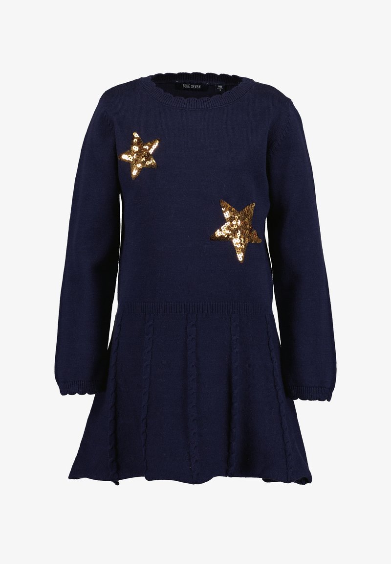 Robe en maille bleu marine à manches longues avec deux décorations étoiles en sequins dorés sur la poitrine et une jupe plissée.