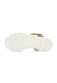 Sandalo color tan con cinturini a stampa leopardata e suola in gomma bianca. La suola presenta una texture scanalata per una migliore presa e stabilità.