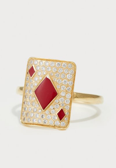 Gold-toned ring featuring a square design with red enamel accents and a cluster of small clear stones for embellishment.