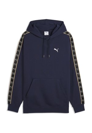 Sweat à capuche bleu marine avec poche avant, capuche à cordon, et bandes noires avec logos Puma blancs sur les manches bordées de doré.