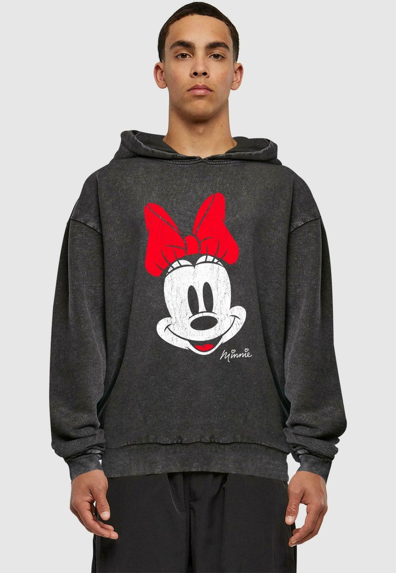 Fekete kapucnis pulóver, nagy, kopott fehér Minnie Mouse grafikával, piros masnival. Bordás mandzsetták és alja. Laza fazon.
