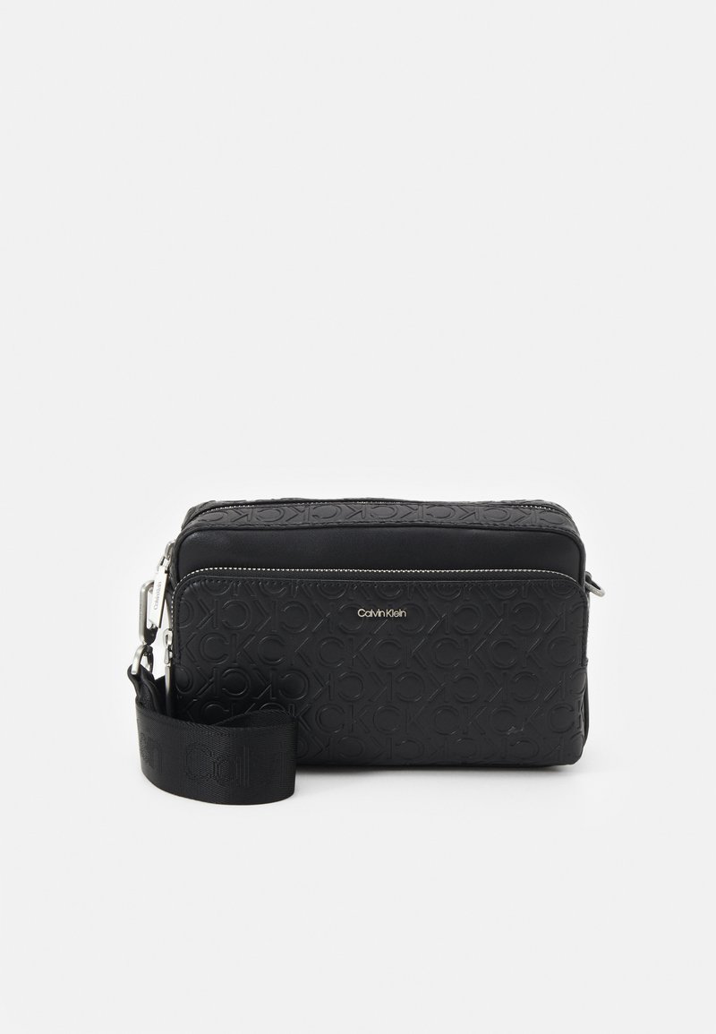Calvin Klein MUST CAMERA BAG Across body bag black Zalando.ie