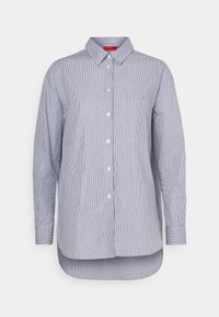 Camicia a maniche lunghe blu e bianca a righe con colletto button-down, taschino frontale e orlo arrotondato. Realizzata in tessuto leggero.