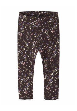 Leggings marron foncé avec un petit motif floral en rose, blanc, violet et vert, avec des ourlets festonnés aux chevilles.