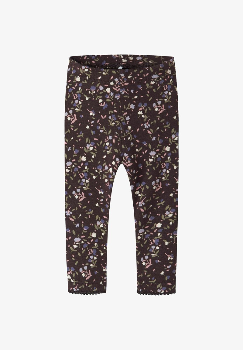 Leggings marron foncé avec un petit motif floral en rose, blanc, violet et vert, avec des ourlets festonnés aux chevilles.