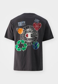 Black cotton t-shirt featuring colorful graphics: a globe, recycling symbol, basketballs, and text, "Unity" and "Love," on the back.