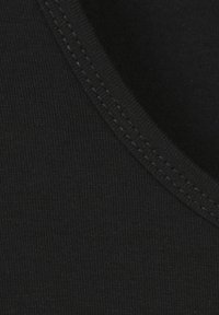 Black fabric with a ribbed texture, featuring a V-neckline and visible stitching along the edges. Smooth and stretchy material.