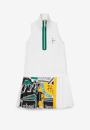Ärmeløs hvid kjole med grøn lynlåskrave, lille tennisplayerbroderi på brystet og plisseret nederdel med sort, grøn og gul tennis-tema print.