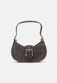 Dark suede handbag with a curved shape, featuring a prominent metal buckle detail and a short leather strap, showcasing contrasting stitching.