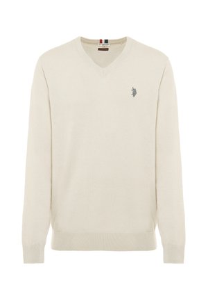 Maglione beige a V realizzato in morbido materiale a maglia. Presenta maniche lunghe, polsini a coste e un piccolo logo ricamato scuro sul petto.