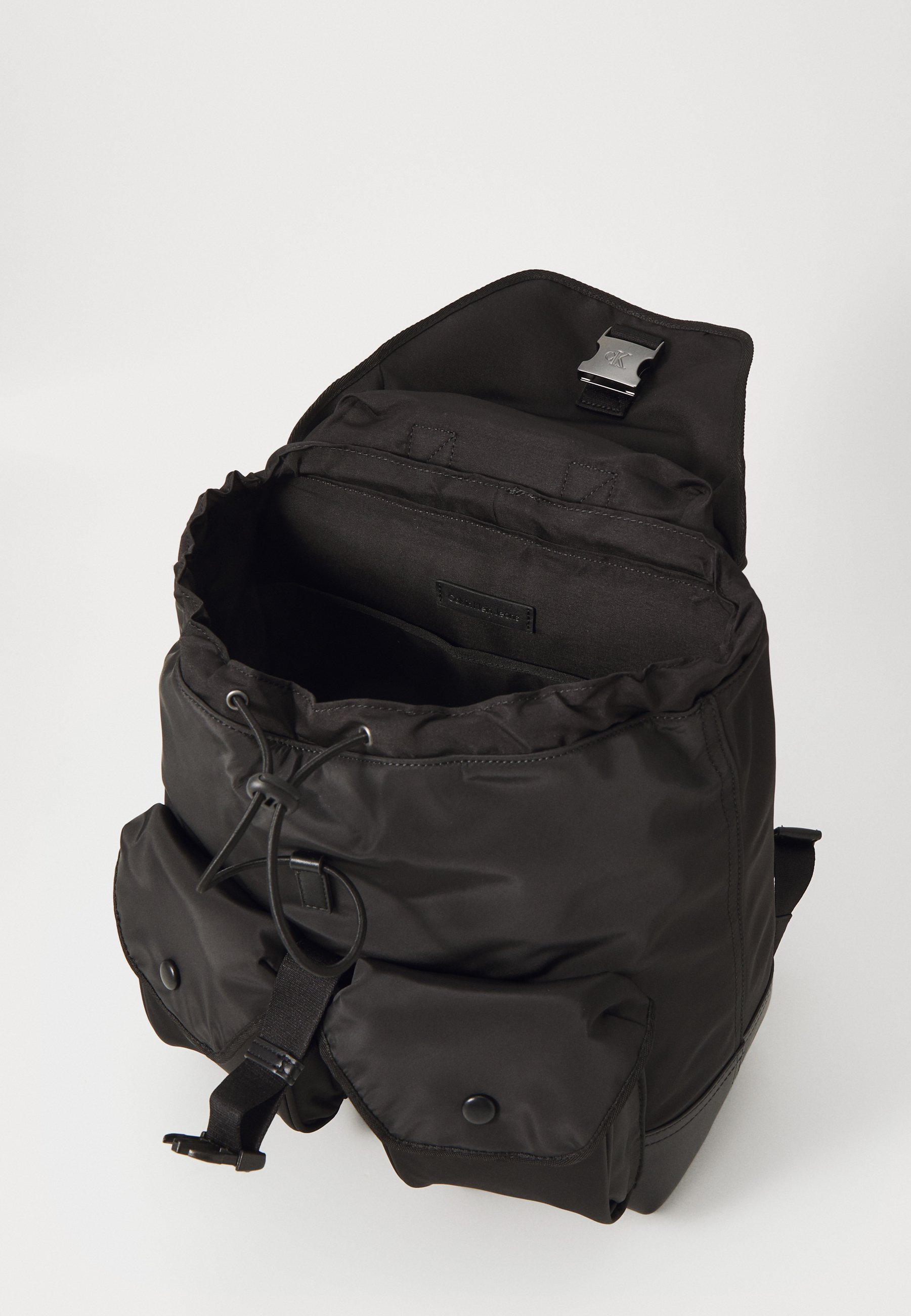 ★ ★ Men's CKJ Speed Clip Utility Flap Backpack Calvin Klein Unisex CKJ Speed Clip Utility Flap Backpack 35