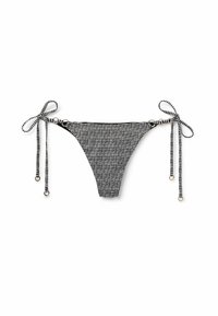 Zwart-wit gestreepte bikini broek met verstelbare touwen, voorzien van metalen accenten en een textuurontwerp.