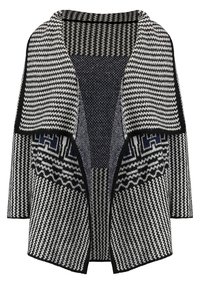 Cardigan en tricot noir et blanc avec un grand col châle et une bordure à motif géométrique, devant ouvert, et un tricot texturé sur l'ensemble.