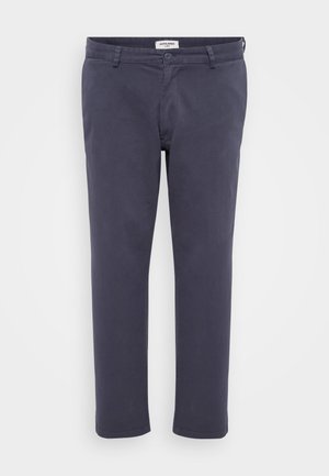 Navy blue trousers made of smooth fabric with a slim fit, featuring front pockets, a button closure, and a clean finish at the hem.