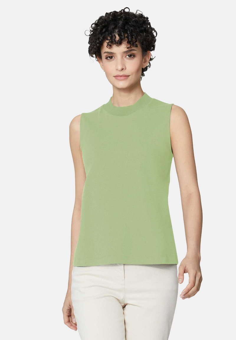 Mouwloze top in lichtgroen, gemaakt van zachte stof. Heeft een hoge hals en een ontspannen pasvorm, met een gladde textuur en een minimaal ontwerp.