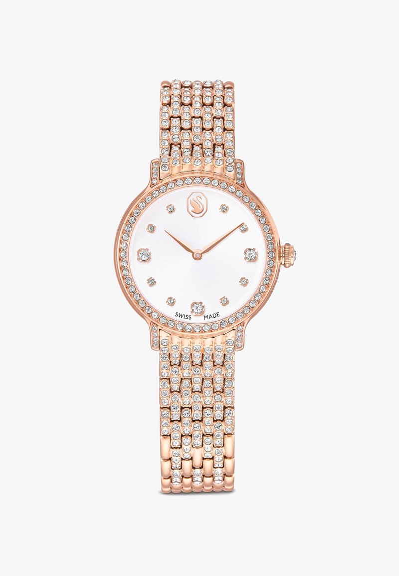 Roségouden polshorloge met een ronde kast, een witte wijzerplaat, kristalaccenten en een armband met meerdere rijen kristallen. Zwitsers vervaardigd met lichtgevende wijzers en uurmarkeringen.