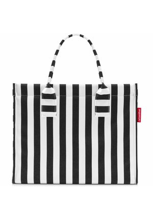 Sac cabas rayé vertical noir et blanc avec deux poignées et une petite étiquette rouge de la marque sur le côté droit.