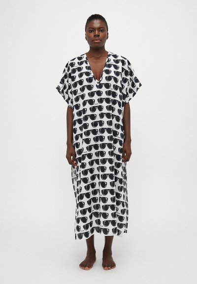 Schwarz-weißer Kaftan mit einem sich wiederholenden Motiv von Sonnenbrillen, V-Ausschnitt, kurzen Ärmeln und einer lockeren Passform. Leichtes Material.