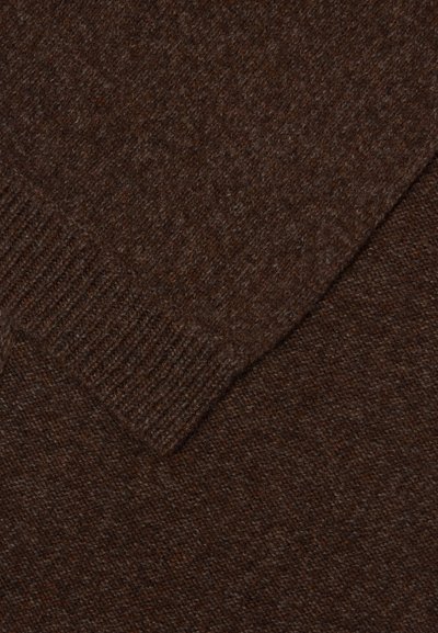 Brown knitted fabric with a soft, textured surface. Features a ribbed neckline and overlapping sections, creating a layered appearance.