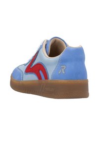 Light blue sneaker with red design accents, smooth suede material, beige interior, and a brown rubber sole featuring textured detailing.