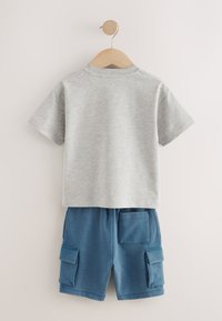 Gray cotton t-shirt with short sleeves, paired with blue cotton cargo shorts featuring two front pockets and a waistband.