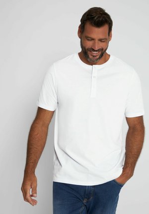 Witte short-sleeve henley t-shirt met drieknoopssluiting. Gemaakt van zachte stof, met een ronde hals en een ontspannen pasvorm. Casual ontwerp.
