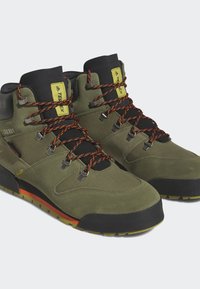 adidas Terrex TERREX SNOWPITCH COLD.RDY HIKING - Hikingschuh - focus olive   core black   pulse olive