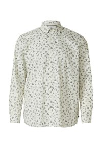 Witte overhemd met zwarte, speelse tekeningen; lange mouwen, puntige kraag en een ontspannen pasvorm. Zachte, lichte stof.