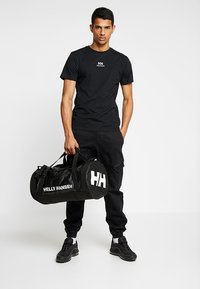 Helly Hansen HH DUFFEL - Bolsa de deporte - black