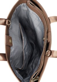 Brown leather handbag with a textile interior featuring a zigzag pattern. Includes one zipped pocket and spacious compartments.