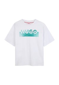 Camiseta de algodón blanca de manga corta con un gráfico en color teal que dice "HUGO" en el pecho. Diseño de cuello redondo, sin patrones adicionales.