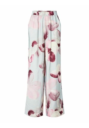 Bukser med vide ben og elastisk midje, lyseblå bakgrunn og store abstrakte blomstermønstre i nyanser av rosa og burgunder.