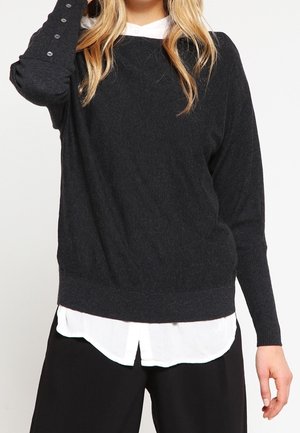 Stickad tröja - black