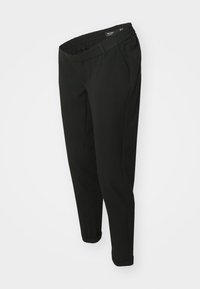 Pantalon noir en tissu extensible, doté d'une large taille élastique, de poches latérales et de poignets fuselés, avec une texture lisse.