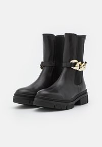 Tamaris Botas con plataforma - black