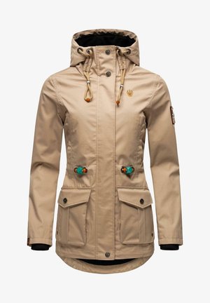 Veste imperméable beige avec capuche, deux poches avant et cordon décoratif orné de perles colorées. Doublure isolante et poignets élastiques.
