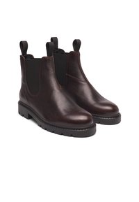 Brown leather Chelsea boots with elastic side panels, slightly rounded toes, textured finish, and chunky rubber soles.