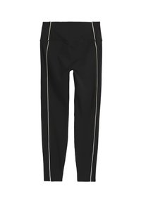 Leggings noirs taille haute avec des rayures verticales blanches sur le devant de chaque jambe.