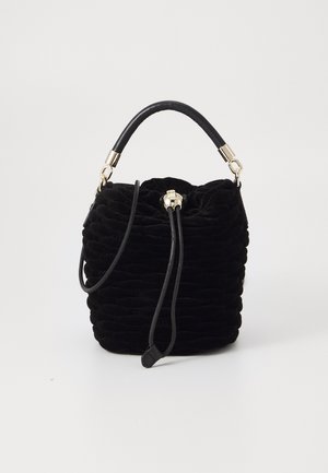 Black velvet bucket bag with a textured, pleated design, featuring a rounded leather handle and gold hardware accents.