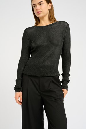 Black ribbed long-sleeve top with a boat neckline and fitted design, crafted from a soft, stretchy material. Subtle sheen and textured finish.